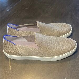 Rothy's Slip-On Sneakers in Sparkling Taupe with Blue Trim